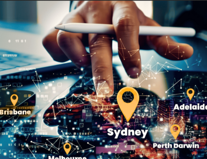 Hand interacting with a digital logistics interface showing location markers across major Australian cities including Sydney, Brisbane, Melbourne, Perth, Darwin, and Adelaide.